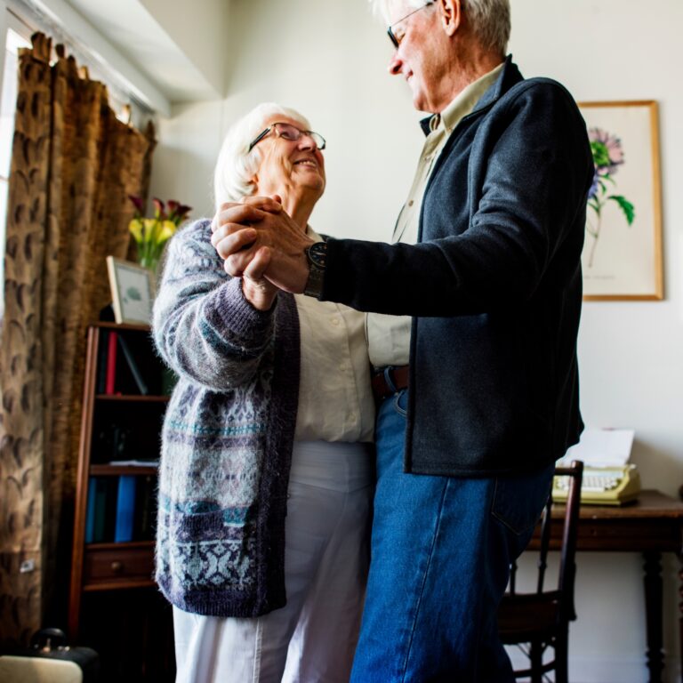 Senior couple dancing together